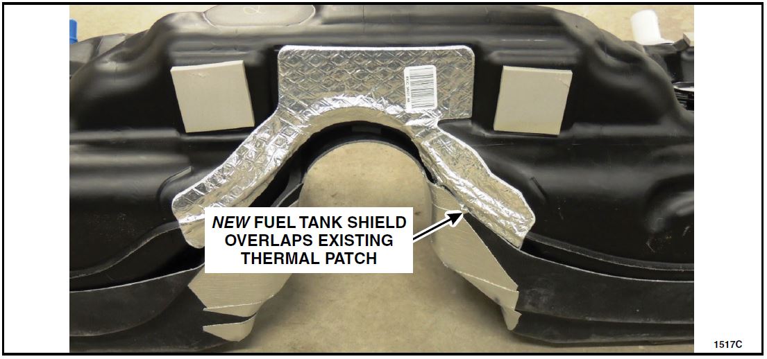 NEW FUEL TANK SHIELD OVERLAPS EXISTING THERMAL PATCH